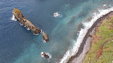 Volcanic rock formations, Ilheus da Rib rock needle, Ribeira da Janela cliff, Lanceiros, Madeira, Portugal, Europe