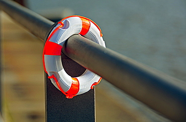 Small lifebelt hanging from a railing, Hamburg, Germany, Europe