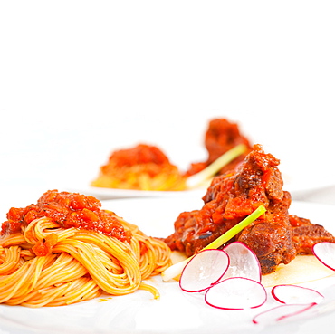 Traditional Italian spaghetti pasta with pork ribbs sauce