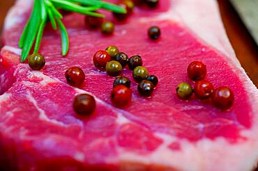 Raw uncooked ribeye beef steak butcher selection