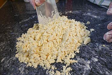 Southern German cuisine, baking, preparing the walnut dough for the hearty vegetable cake with walnut base, Germany, Europe