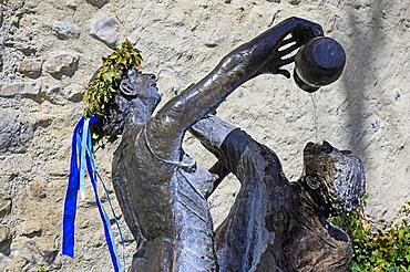 Head-washing fountain at the city wall by Gisela Steimle with Easter decoration, realised 1993, Wangen im Allgaeu, Baden-Wuerttemberg, Germany, Europe