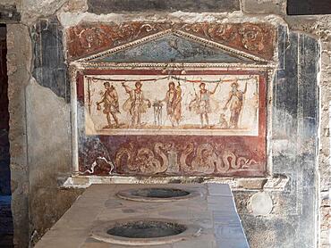 House shrine, lararium in a thermopolium, Pompeii, Campania, Italy, Europe