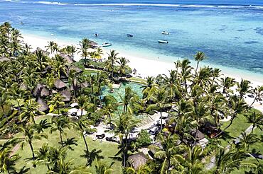 Aerial view The beach of Flic en Flac with luxury hotel and palm trees, Mauritius, Africa