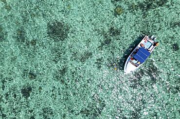 Aerial view, reefs of Flic en Flac beach with excursion boat, Mauritius, Africa