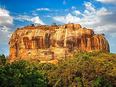 Sigiriya rock, famous Sri Lankan tourist landmark on sunset, Sri Lanka, Asia