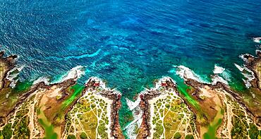 Aerial view of ocean waves and fantastic rocky shoreline, Aerial view of a coastline along Great Ocean Road, Aerial view of waves hitting rocks on beach with turquoise water