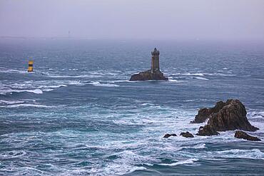 Pointe du Raz Beg ar Raz, rocky cape with the offshore lighthouses Phare de la Vieille and Tourelle de la Plate, end of Cap Sizun in the west of the commune of Plogoff, department of Finistere Penn ar Bed, region of Brittany Breizh, France, Europe