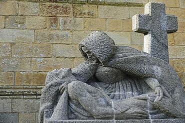 Modern granite Pieta in front of the Gothic cathedral of Saint-Paul Aurelien, Saint-Pol-de-Leon, department of Finistere Penn ar Bed, region of Brittany Breizh, France, Europe