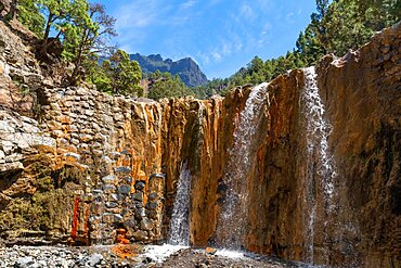 Cascada de Colores waterfall, Caldera de Taburiente National Park volcanic basin, Palma Island, Canary Islands, Spain, Europe