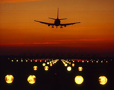 Landing aeroplane, afterglow, dusk, Airport Riem Munich Bavaria Germany, Landing aeroplane, afterglow, dusk, Airport Riem Munich Bavaria Germany