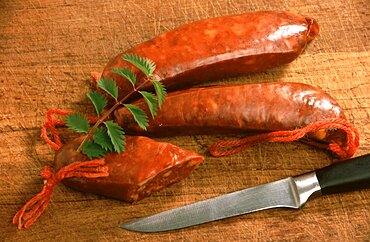 Chorizo, a spicy, firm, coarse-grained raw pork sausage from Spain and Portugal, seasoned with paprika and garlic