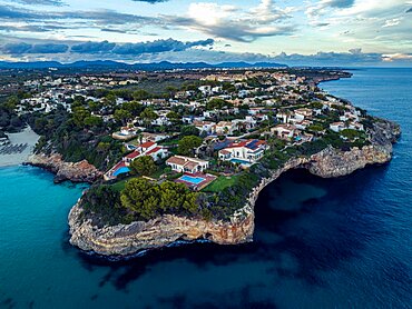 Sunset over Cala Anguila-Cala Mendia from a drone, Porto Cristo, Majorca, Spain, Europe