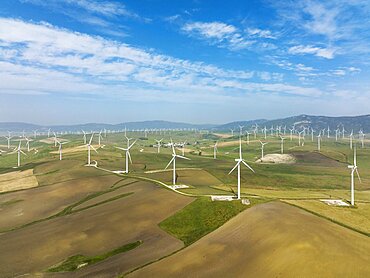 Windmills on a wind farm near Zahara de los Atunes, aerial view, drone shot, Cadiz province, Andalusia, Spain, Europe