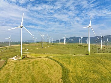 Windmills on a wind farm near Zahara de los Atunes, aerial view, drone shot, Cadiz province, Andalusia, Spain, Europe