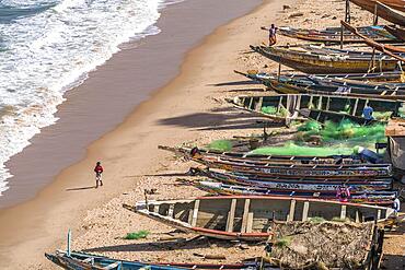 Fishing boats on the beach from the fish market in Bakau, Gambia, West Africa, Africa