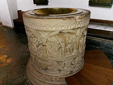 Romanesque baptismal font from 1129 in the former collegiate church of St. Boniface, Freckenhorst, Warendorf district, Baden-Wuerttemberg, Germany, Europe