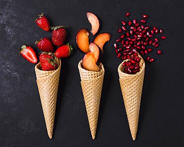 Ice cream cones with fruits