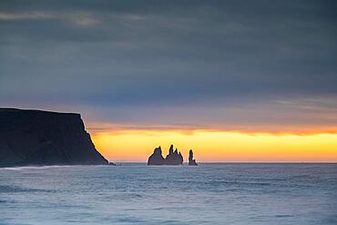 View from Cape Dyrholaey, rock formations Reynisdrangar and Mount Reynisfjall, Vik i Myrdal, Suourland, Iceland, Europe