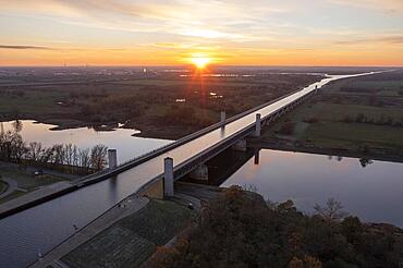 Sunset at the Magdeburg waterway junction, Mittelland Canal leads in trough bridge over Elbe, longest canal bridge in Europe, Hohenwarthe, Saxony-Anhalt, Germany, Europe