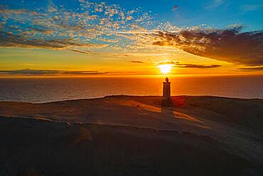 Sunset over Rubjerg Knude Lighthouse, Jutland, Denmark, Europe