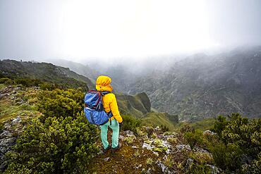 Hiker, fog in the mountains, Achada do Teixeira, Madeira, Portugal, Europe