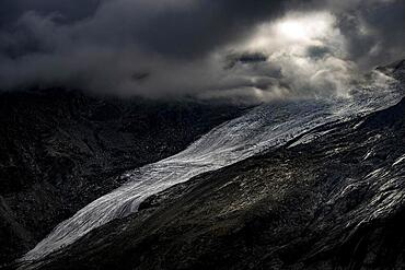 Bernina Group with Rosegg Glacier and dramatic clouds at blue hour, St Moritz, Engadin, Grisons, Switzerland, Europe