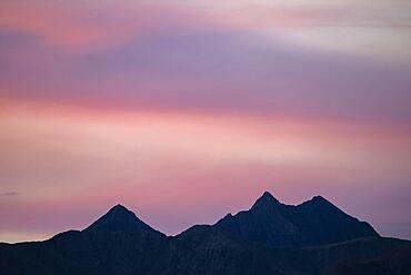 Engadine mountains with cloudy sky at blue hour, St Moritz, Engadine, Grisons, Switzerland, Europe