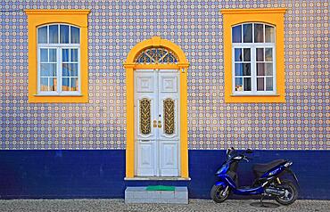 House facade with traditional azulejo tiles in Ferragudo, Algarve, Portugal, Europe