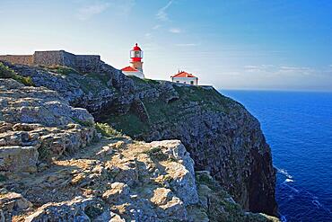 The lighthouse directly at the Cabo de Sao Vicente in the Algarve at the most south-western point of the European mainland, Portugal, Europe