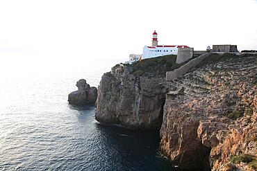 The lighthouse directly at the Cabo de Sao Vicente in the Algarve at the most south-western point of the European mainland, Portugal, Europe