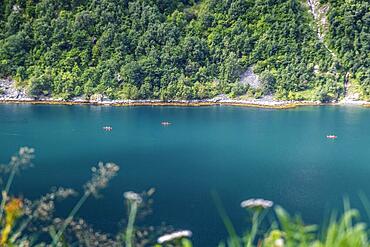 Kayakers paddling on a fjord in Norway