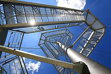 Steel observation tower and suspension bridge on the Iller in fine weather. Bad Groenenbach, Unterallgaeu, Swabia, Bavaria, Germany, Europe