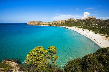 Sandy beach beach and mountains, Plage de lOstriconi, near LIle-Rousse, Departement Haute-Corse, Corsica, Mediterranean Sea, France, Europe