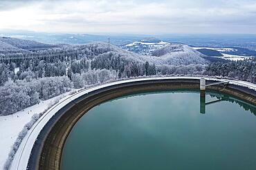 Pumped storage plant Glems of EnBW Kraftwerke AG, upper storage basin on the Swabian Alb, trees and forest are covered with hoarfrost, Eningen, Baden-Wuerttemberg, Germany, Europe