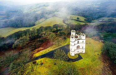 Misty morning over Haldon Belvedere from a drone, Lawrence Castle, Higher Ashton, Exeter, Devon, England, United Kingdom, Europe