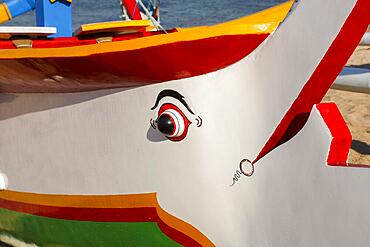 Brightly painted fishing outriggers on the beach at Sanur, Bali, Indonesia, Asia