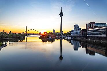 Media harbour at sunrise with view of Rhine tower and Rhine knee bridge, Rhine, Duesseldorf, North Rhine-Westphalia