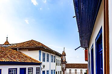 Facade of old colorful colonial houses and church in the historic town of Diamantina in Minas Gerais state, Brazil, Brasil, South America