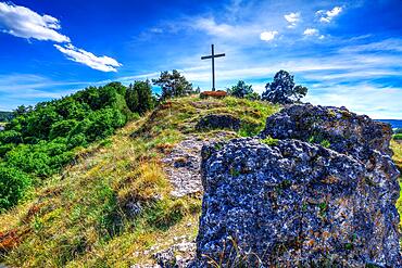 Wooden cross on a hill called Kirchberg in the village Pfuenz (Bavaria)