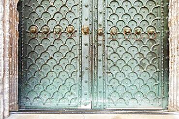 Bronze lion heads on the main portal of St Mark's Basilica, Venice, Italy, Europe