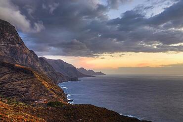 Dusk, grey clouds, grey sea, pink sky, cliff, sea, west coast, Gran Canaria, Canary Islands, Spain, Europe