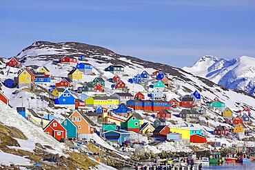 Wooden houses in different colours in winter landscape, Arctic, Kaangamuit, West Greenland, Denmark, Europe