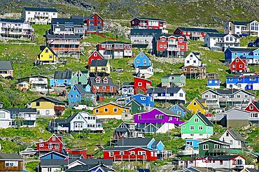 Houses in different colours on a mountainside, Qaqortoq, Kujalleq Municipality, Greenland, Denmark, North America