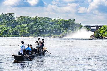 Fishermen fishing below the rapids on the Tshopo river, Kisangani, DR Congo