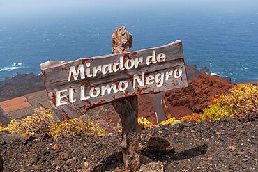 Informative sign of the black loin viewpoint on the southwest coast of El Hierro. Canary Islands