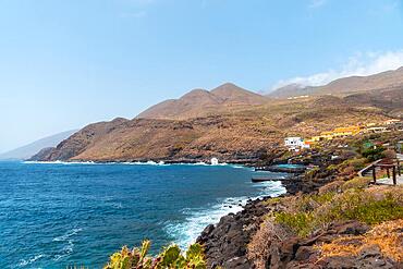 Beautiful coast of the village of La Caleta by the sea in El Hierro, Canary Islands, flowers and captus