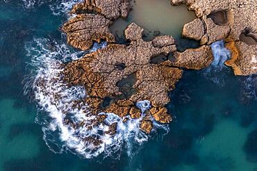 Aerial view, sunset at Praia do Evaristo, rocks and cliffs in the Algarve, Portugal, Europe