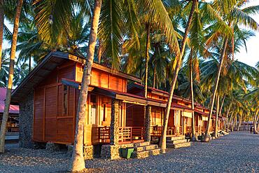 Bungalows on the beach of Ampana on Sulawesi. The town is the starting point for the onward journey to the Togian Islands which are considered a diving paradise in the Gulf of Tomini