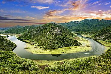 River bend of the Rijeka Crnojevica river at sunset, view from Pavlova Strana viewpoint, Lake Scutari National Park, near Cetinje, Montenegro, Europe